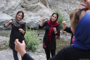 Mideast Iran Laughter Yoga
